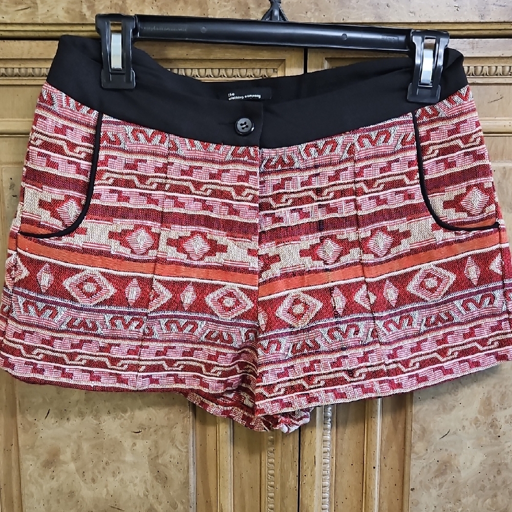 the clothing company Red Aztec Patterned High Waist Shorts with Black Waistband